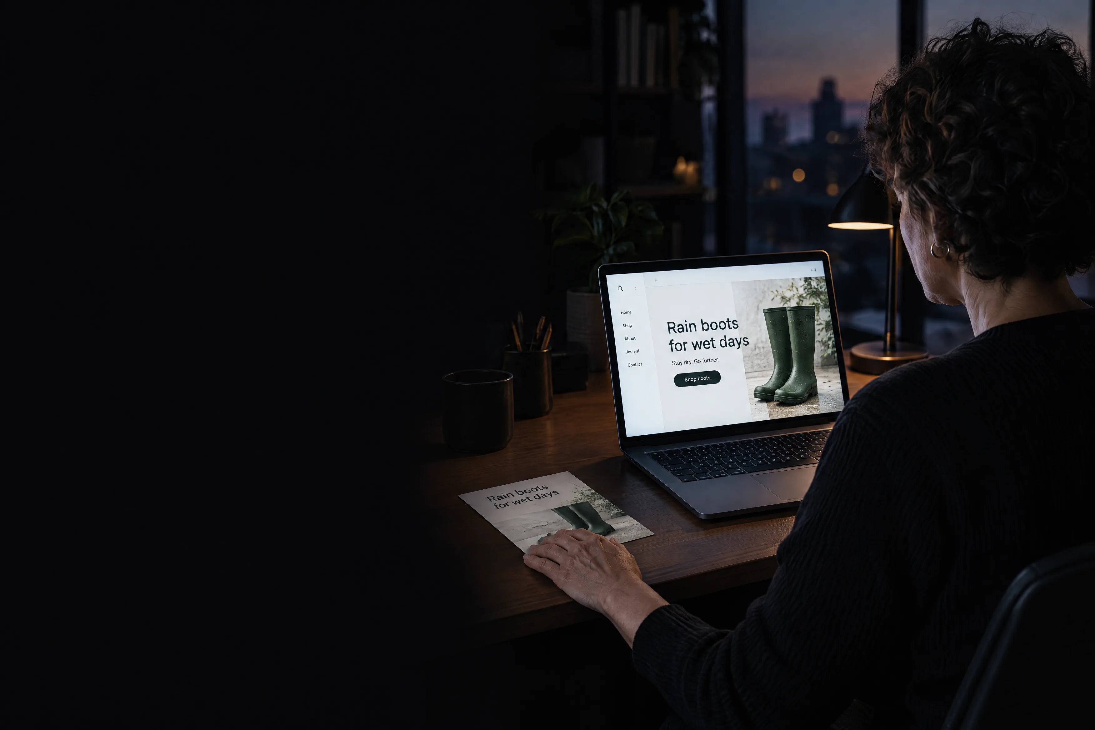 A marketing lead checks that your landing page headline matches the printed ad card beside the laptop A marketing lead checks that your landing page headline matches the printed ad card beside the laptop