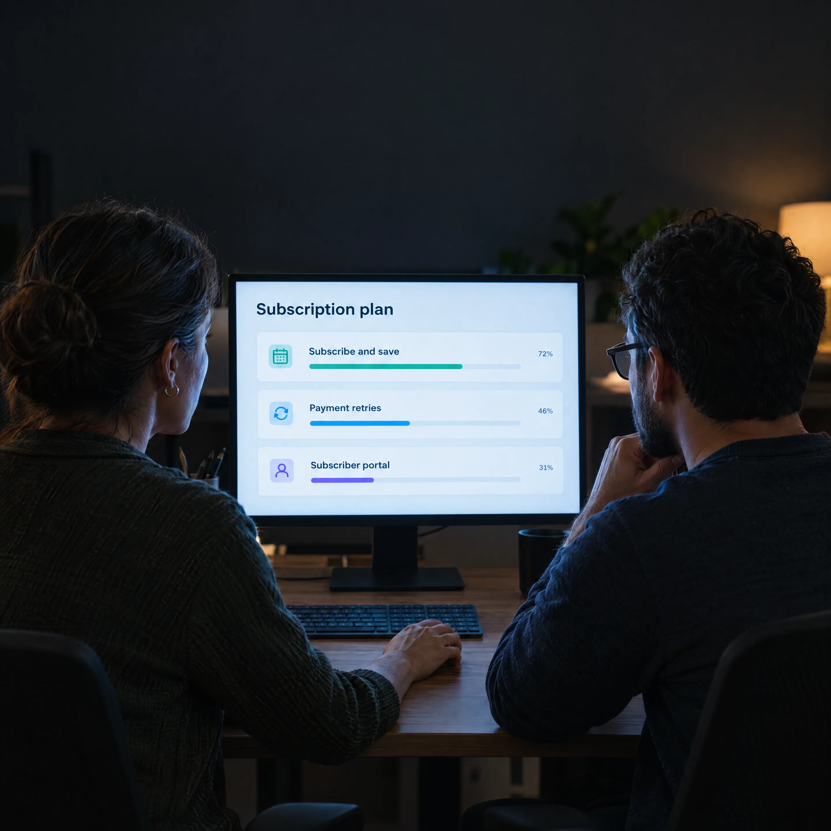 An ecommerce manager and a developer review a subscription plan for their store
