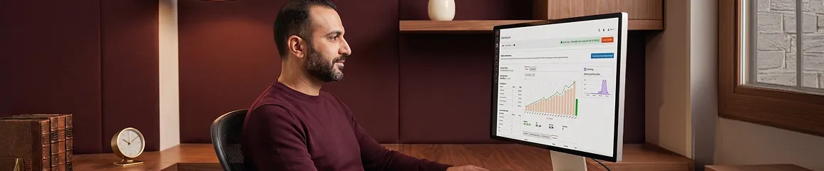 Magento emergency support engineer at monitoring workstation showing site restored green status after critical incident resolution Magento emergency support engineer at monitoring workstation showing site restored green status after critical incident resolution