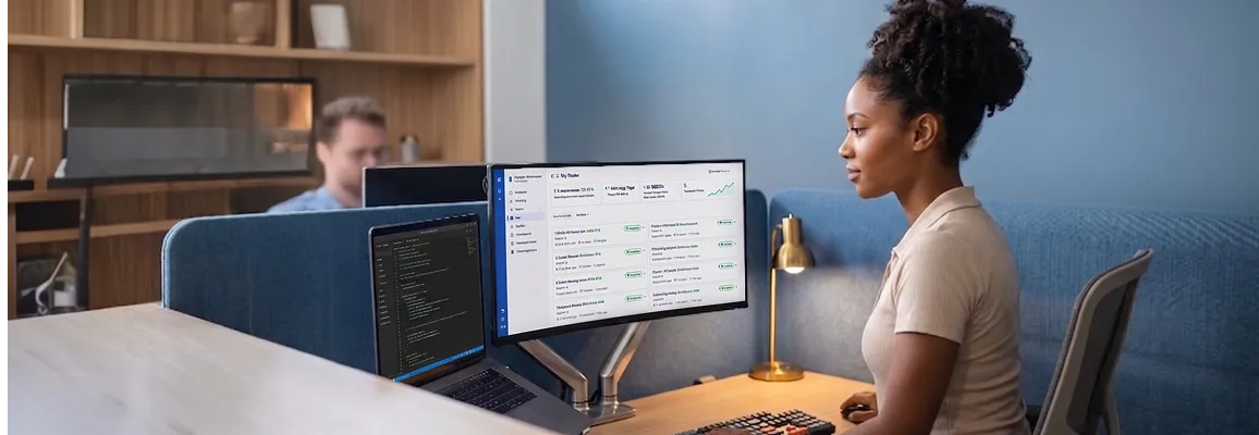 Senior Magento support engineer reviewing live service level agreement dashboard with response time metrics visible on screen Senior Magento support engineer reviewing live service level agreement dashboard with response time metrics visible on screen