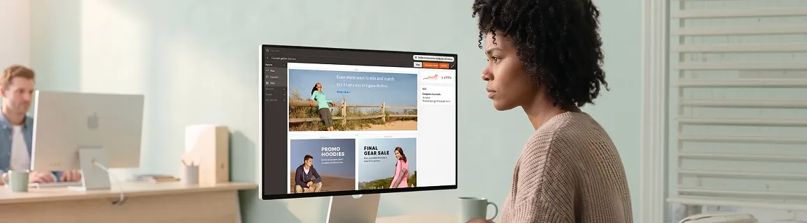 Black woman merchant calmly reviewing Adobe Commerce Page Builder editor with B2B Company Accounts tile and +24% revenue sparkline, cool mint workspace Black woman merchant calmly reviewing Adobe Commerce Page Builder editor with B2B Company Accounts tile and +24% revenue sparkline, cool mint workspace