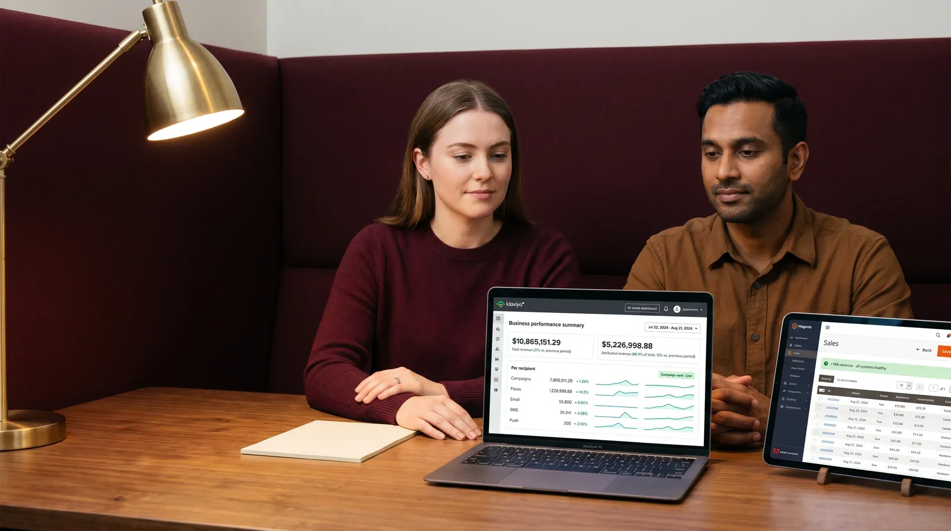 Marketing and engineering teammates exchanging a relieved look at a desk on Klaviyo launch day, with an inbox visible in the background Marketing and engineering teammates exchanging a relieved look at a desk on Klaviyo launch day, with an inbox visible in the background