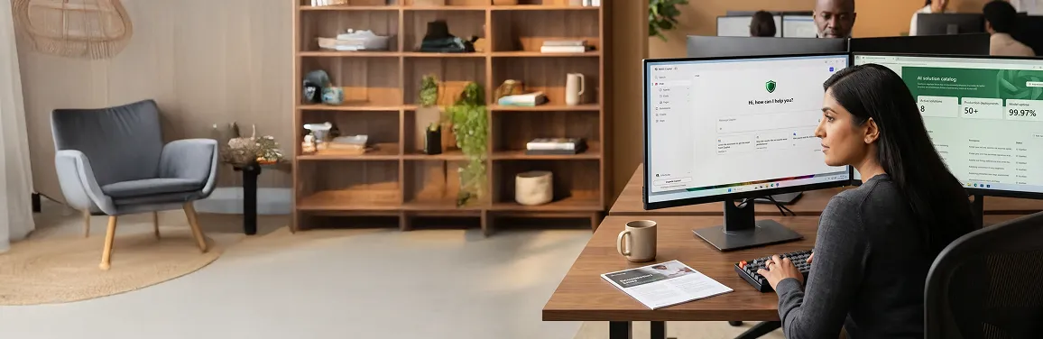 Senior engineer reviewing AI model pipeline outputs at workstation with dual monitors Senior engineer reviewing AI model pipeline outputs at workstation with dual monitors