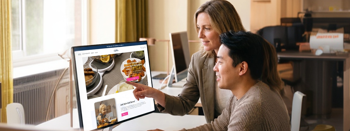 Brand and creative team reviewing live Amazon brand store together on screen, natural office light, satisfied expressions Brand and creative team reviewing live Amazon brand store together on screen, natural office light, satisfied expressions