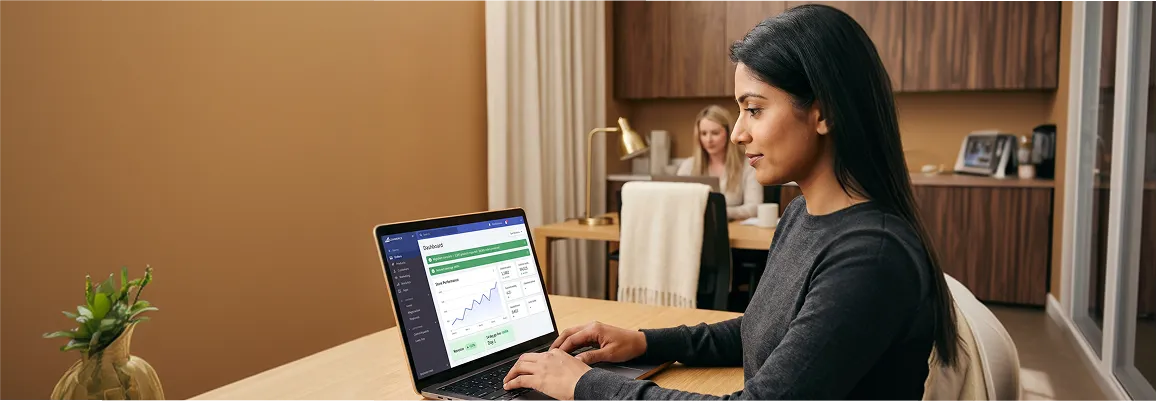 Merchant reviewing BigCommerce store performance dashboard after migrating from Magento Merchant reviewing BigCommerce store performance dashboard after migrating from Magento