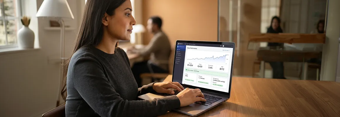 Ecommerce founder reviewing the rescued BigCommerce control panel showing restored revenue and healthy KPIs after Redefine store rescue Ecommerce founder reviewing the rescued BigCommerce control panel showing restored revenue and healthy KPIs after Redefine store rescue