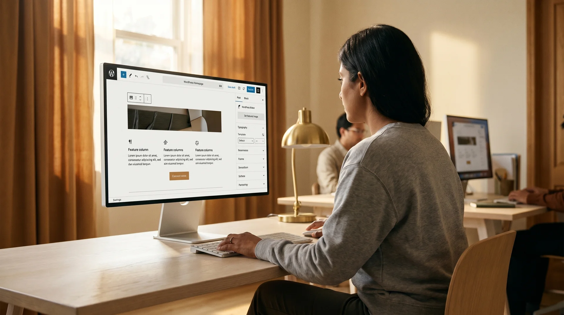 Web designer reviewing WordPress site mockup on a large monitor in a naturally lit studio workspace Web designer reviewing WordPress site mockup on a large monitor in a naturally lit studio workspace