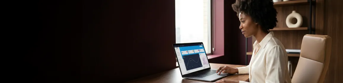 SaaS product lead reviewing user flow diagrams and analytics on laptop at desk with natural window light SaaS product lead reviewing user flow diagrams and analytics on laptop at desk with natural window light