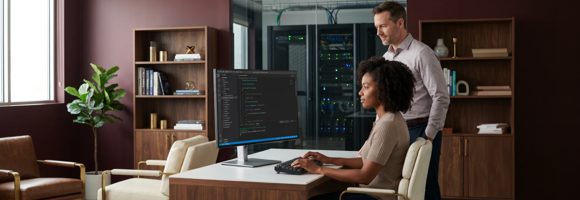 Laravel backend development team at workstations managing enterprise server infrastructure, warm desk lamp light, side angle Laravel backend development team at workstations managing enterprise server infrastructure, warm desk lamp light, side angle