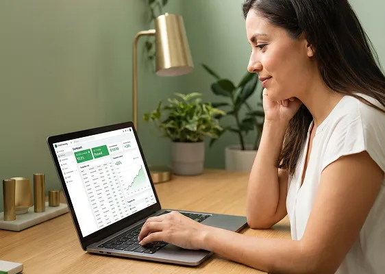 Fintech developer reviewing a secure, fully compliant payment platform with healthy green metrics and a passed-audit status, warm bright resolved workspace, side angle Fintech developer reviewing a secure, fully compliant payment platform with healthy green metrics and a passed-audit status, warm bright resolved workspace, side angle
