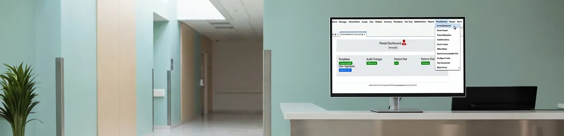 Completed patient portal healthcare software on large clinical workstation monitor in hospital setting with clean overhead clinical lighting