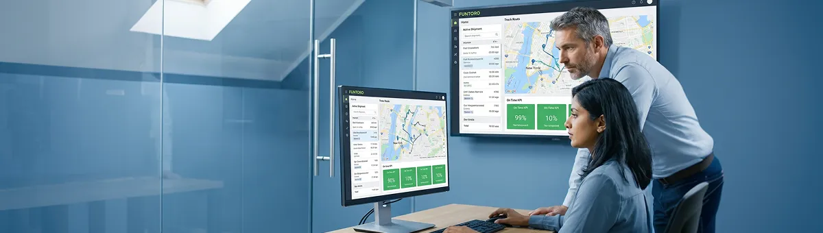 Logistics operations team at command center with multiple monitors showing live route maps and shipment tracking data, natural overhead light Logistics operations team at command center with multiple monitors showing live route maps and shipment tracking data, natural overhead light