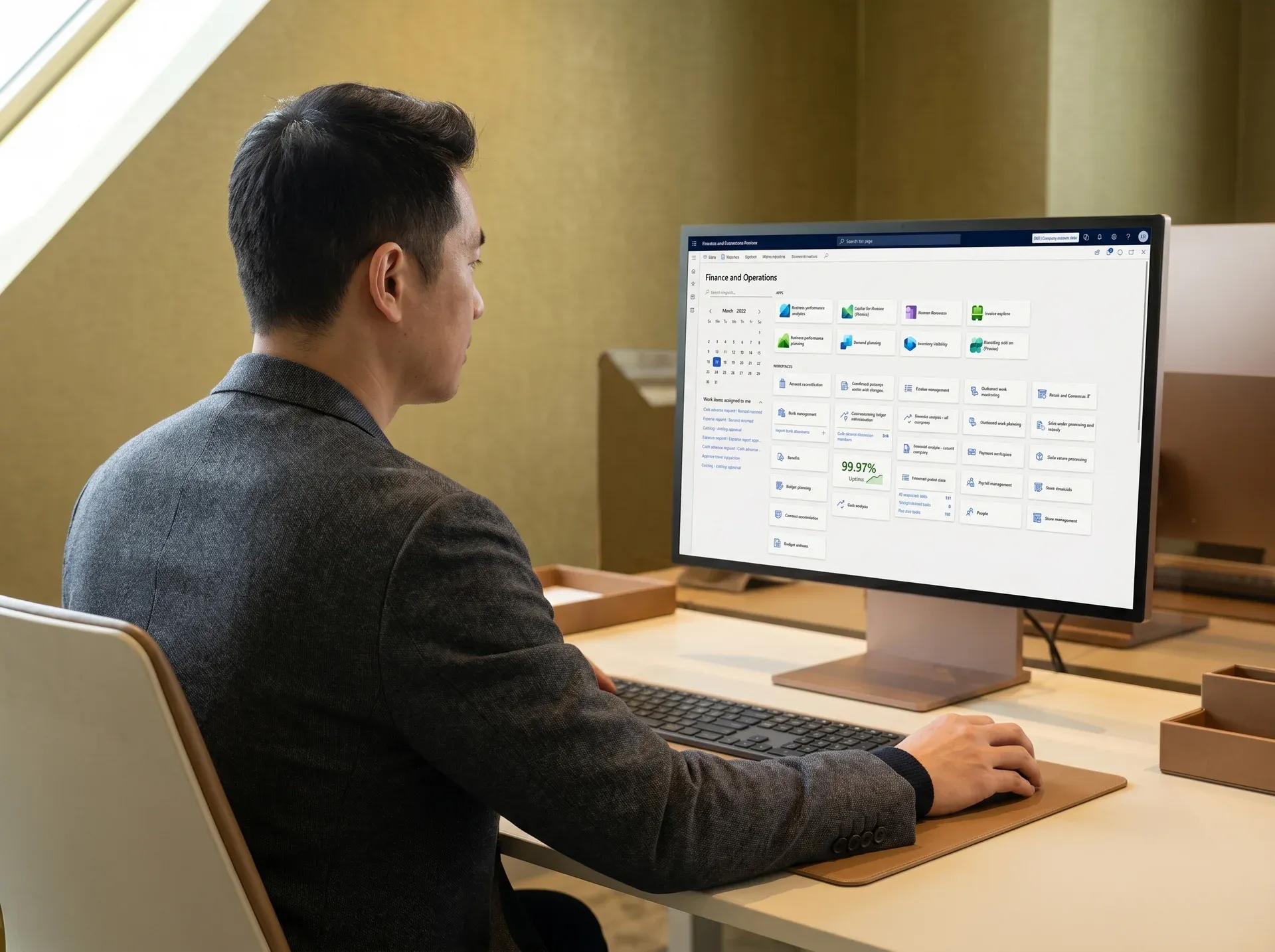 Confident operations lead reviewing live Dynamics 365 system performance on a widescreen display