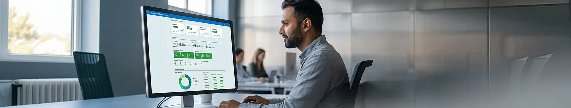 Operations manager working confidently on one unified Microsoft Dynamics 365 dashboard at an organized desk after replacing disconnected tools Operations manager working confidently on one unified Microsoft Dynamics 365 dashboard at an organized desk after replacing disconnected tools