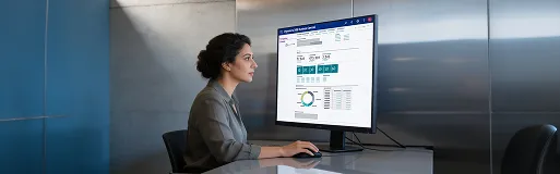 Operations analyst reviewing migrated inventory and customer records in Business Central Operations analyst reviewing migrated inventory and customer records in Business Central