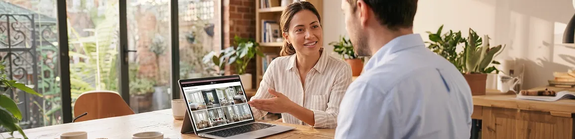 Operations team lead reviewing clean real-time Dynamics 365 dashboard after successful migration go-live Operations team lead reviewing clean real-time Dynamics 365 dashboard after successful migration go-live