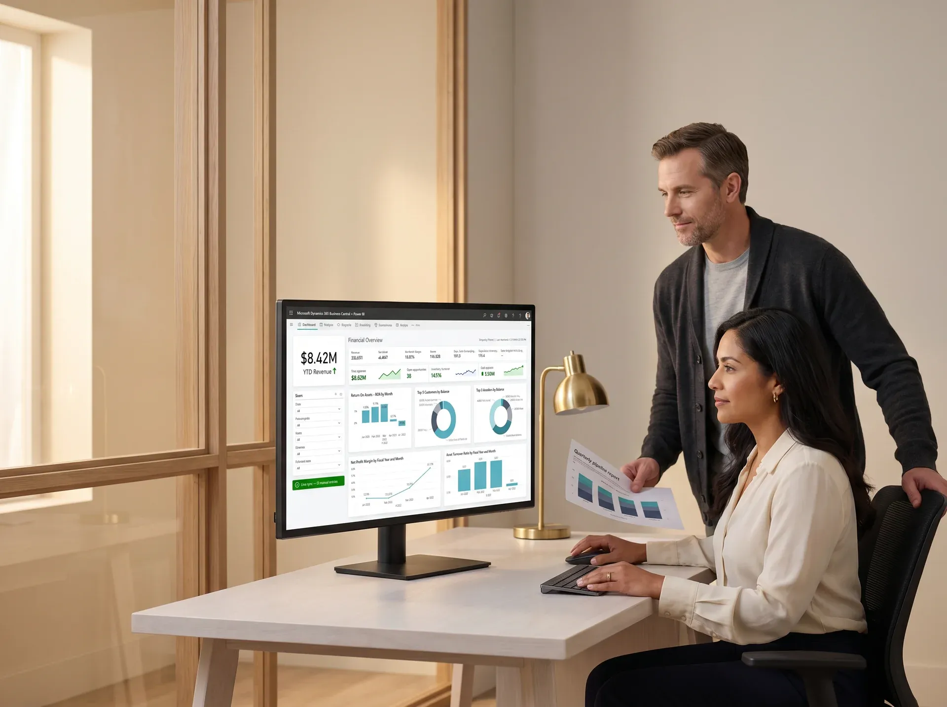 Operations and sales team reviewing unified CRM and ERP analytics dashboard on large monitor, focused and engaged Operations and sales team reviewing unified CRM and ERP analytics dashboard on large monitor, focused and engaged