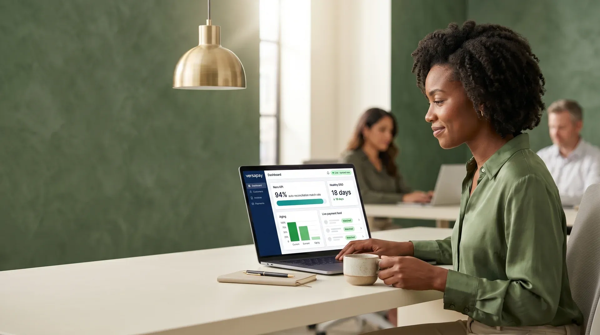 Finance manager reviewing clean automated accounts receivable dashboard with relieved expression Finance manager reviewing clean automated accounts receivable dashboard with relieved expression