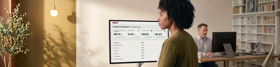 Fulfillment operations specialist reviewing live Costco compliance dashboard with healthy advance ship notice, chargeback and invoice match metrics Fulfillment operations specialist reviewing live Costco compliance dashboard with healthy advance ship notice, chargeback and invoice match metrics