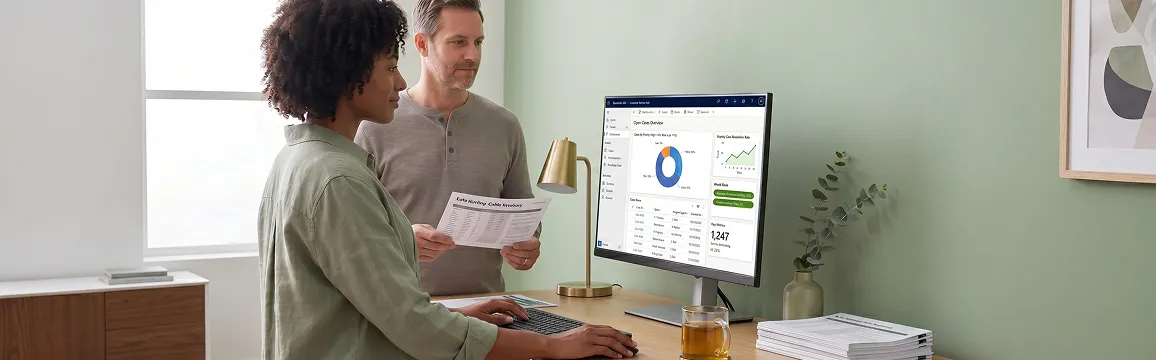 Operations team reviewing healthy Kohl integration run-history dashboard with all-green Succeeded rows, calm collaborative shared-gaze moment Operations team reviewing healthy Kohl integration run-history dashboard with all-green Succeeded rows, calm collaborative shared-gaze moment