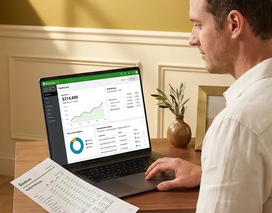 Shopify store merchant reviewing clean automated QuickBooks monthly reports at desk, visible relief, natural window light Shopify store merchant reviewing clean automated QuickBooks monthly reports at desk, visible relief, natural window light