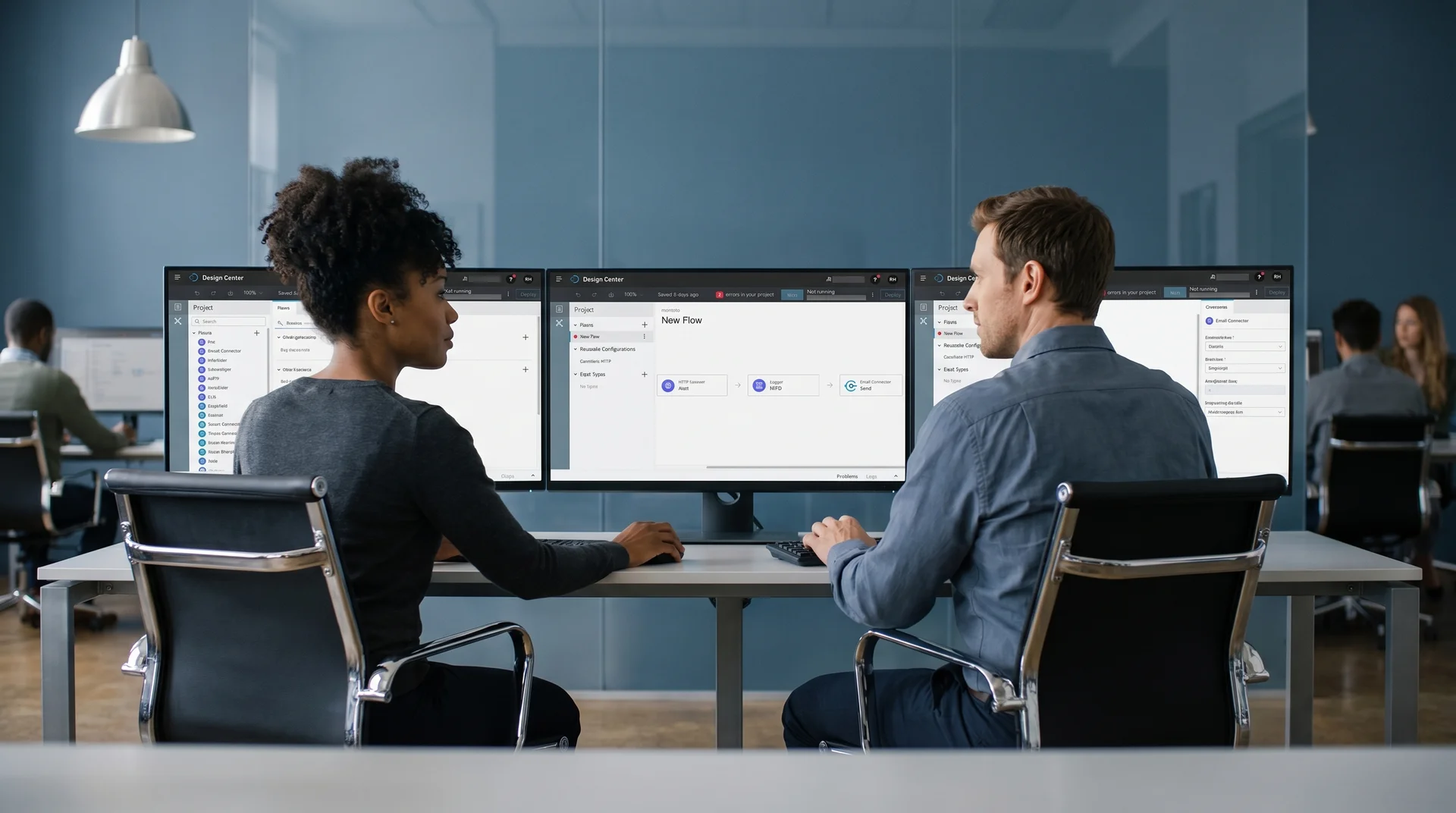 Enterprise technology team reviewing a multi-system integration architecture diagram on large monitors Enterprise technology team reviewing a multi-system integration architecture diagram on large monitors