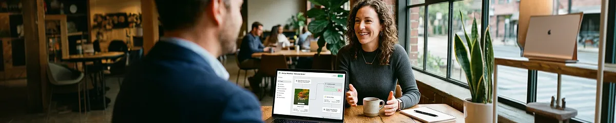 Small ecommerce team reviewing Klaviyo email automation results, collaborative workspace, warm ambient lighting Small ecommerce team reviewing Klaviyo email automation results, collaborative workspace, warm ambient lighting