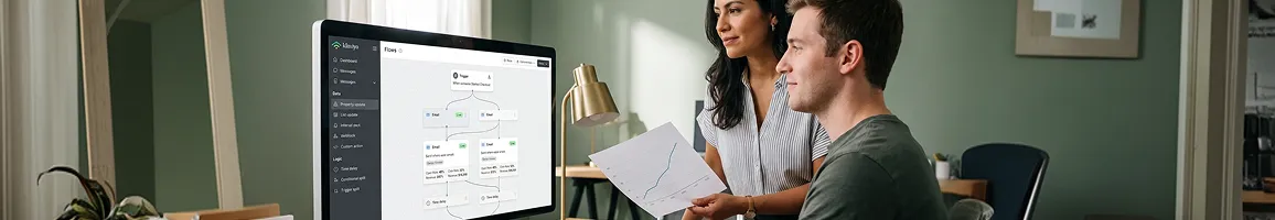 Lifecycle team reviewing a fully built Klaviyo Flows visual builder with every flow live, calm and collaborative Lifecycle team reviewing a fully built Klaviyo Flows visual builder with every flow live, calm and collaborative