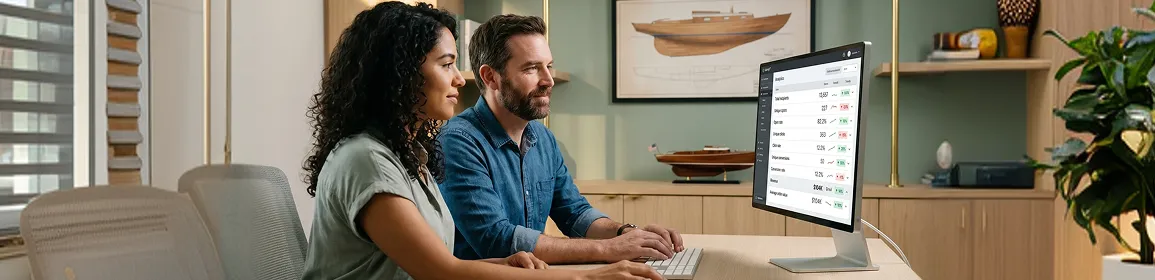 Customer relationship management analyst reviewing Mailchimp to Klaviyo data migration results on computer screen