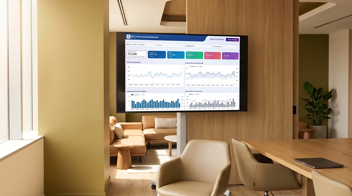 Marketing team reviewing multi-channel campaign performance showing significant revenue growth milestone, natural office light Marketing team reviewing multi-channel campaign performance showing significant revenue growth milestone, natural office light