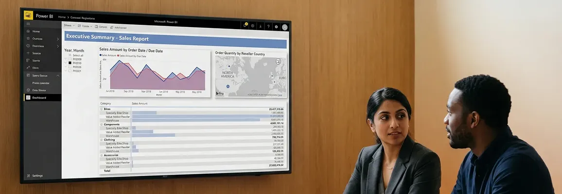 Chief financial officer and finance lead reviewing a Power BI executive dashboard in a modern boardroom Chief financial officer and finance lead reviewing a Power BI executive dashboard in a modern boardroom