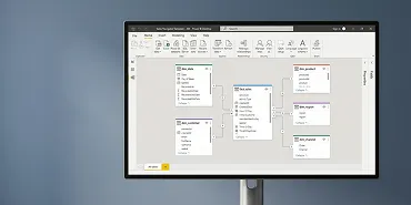 Power BI Desktop showing a data model view with star schema table relationships Power BI Desktop showing a data model view with star schema table relationships