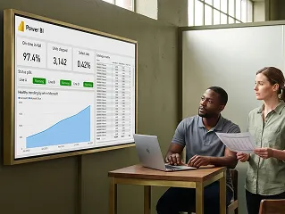 Swan manufacturing team reviewing Power BI production dashboard on a wall screen