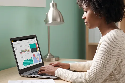 Finance analyst calmly working at a clean desk with a healthy Power BI dashboard, cool mint and birch palette Finance analyst calmly working at a clean desk with a healthy Power BI dashboard, cool mint and birch palette