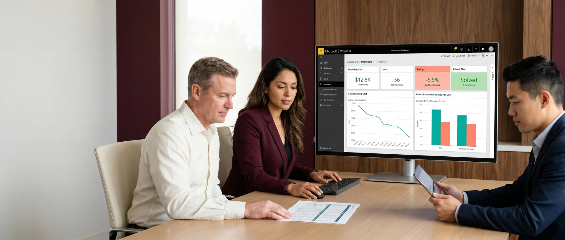 Finance and business intelligence team reviewing a finalized Power BI licensing plan together Finance and business intelligence team reviewing a finalized Power BI licensing plan together