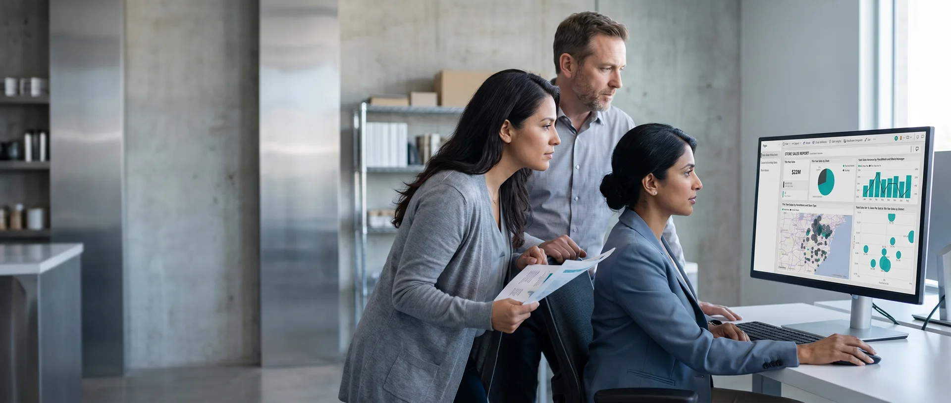 Finance and operations team reviewing governed retail and ecommerce analytics in Power BI on a shared screen Finance and operations team reviewing governed retail and ecommerce analytics in Power BI on a shared screen