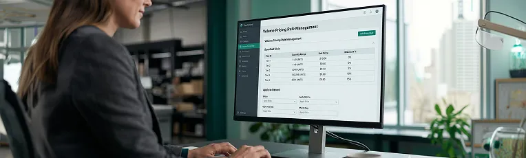 Sales team reviewing tiered pricing structures with wholesale accounts in a modern office Sales team reviewing tiered pricing structures with wholesale accounts in a modern office