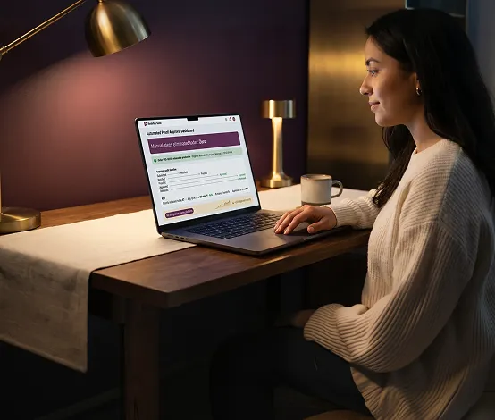 Operations team at a dual-screen setup reviewing proof approval workflow and order management system dashboard Operations team at a dual-screen setup reviewing proof approval workflow and order management system dashboard