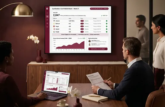Product catalog team reviewing live channel publish success status on large monitor with green indicators Product catalog team reviewing live channel publish success status on large monitor with green indicators