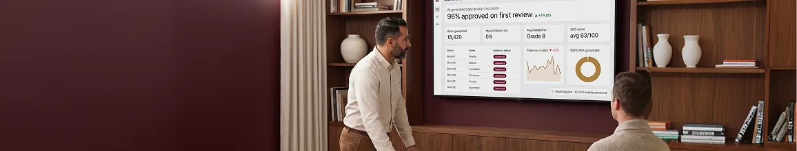 Product catalog operations team at dual-monitor workstation approving AI-generated descriptions before launch Product catalog operations team at dual-monitor workstation approving AI-generated descriptions before launch