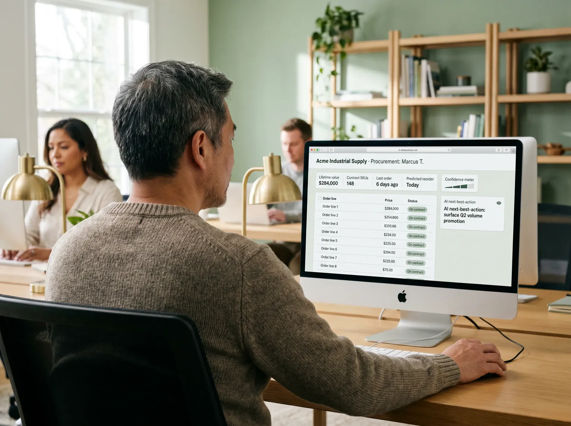 Business-to-business account manager reviewing a personalised order view on a desktop platform Business-to-business account manager reviewing a personalised order view on a desktop platform