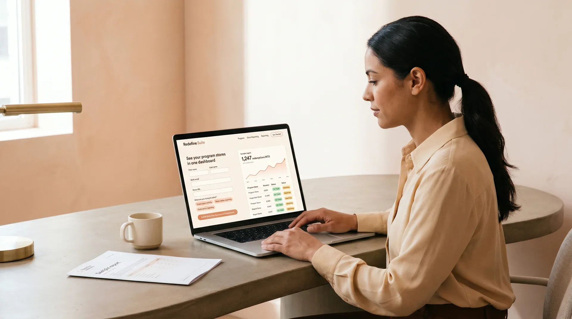Analytics professional reviewing program store performance dashboard data on laptop Analytics professional reviewing program store performance dashboard data on laptop