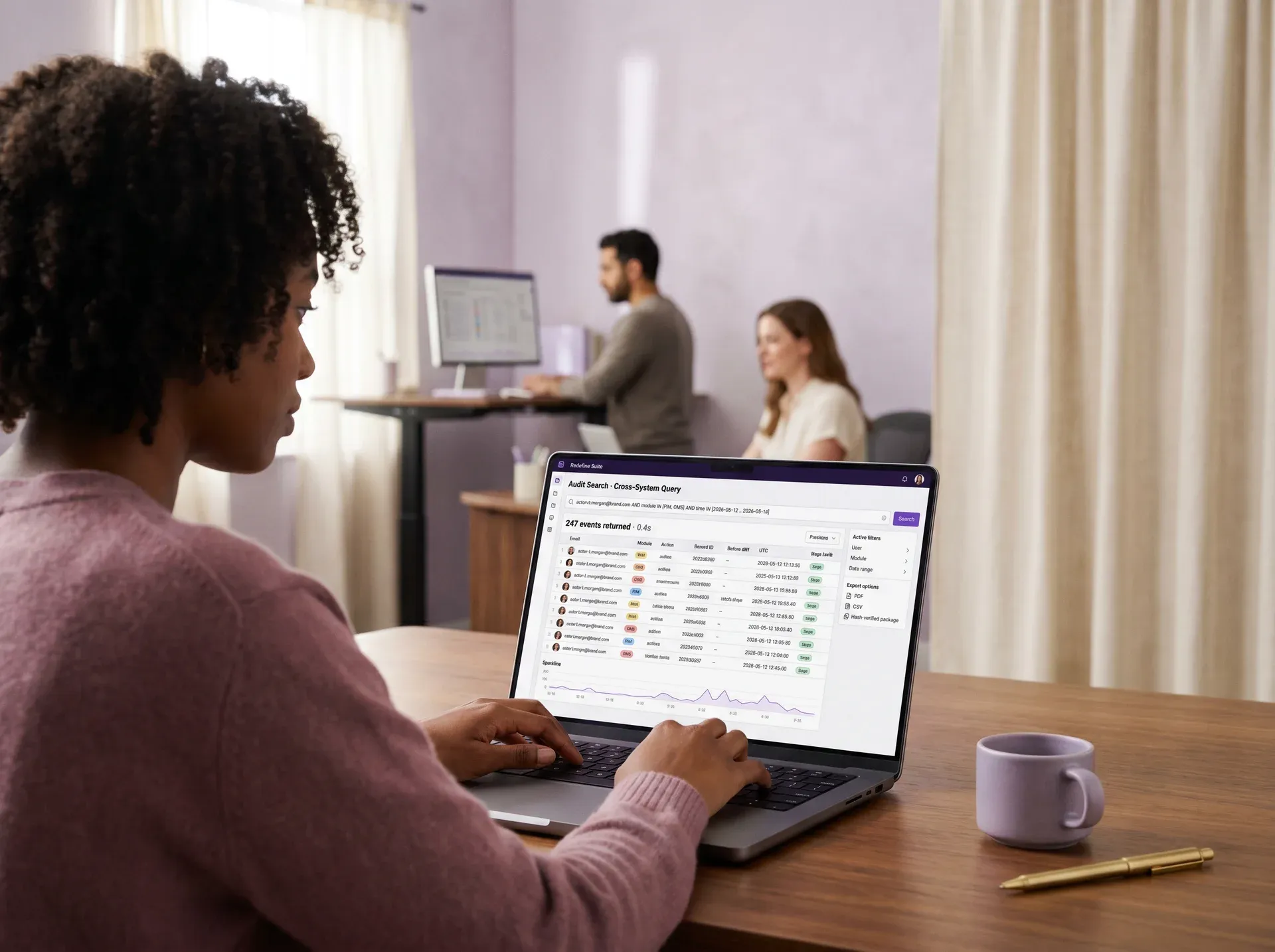 Operations analyst running a cross-system audit query on a laptop Operations analyst running a cross-system audit query on a laptop