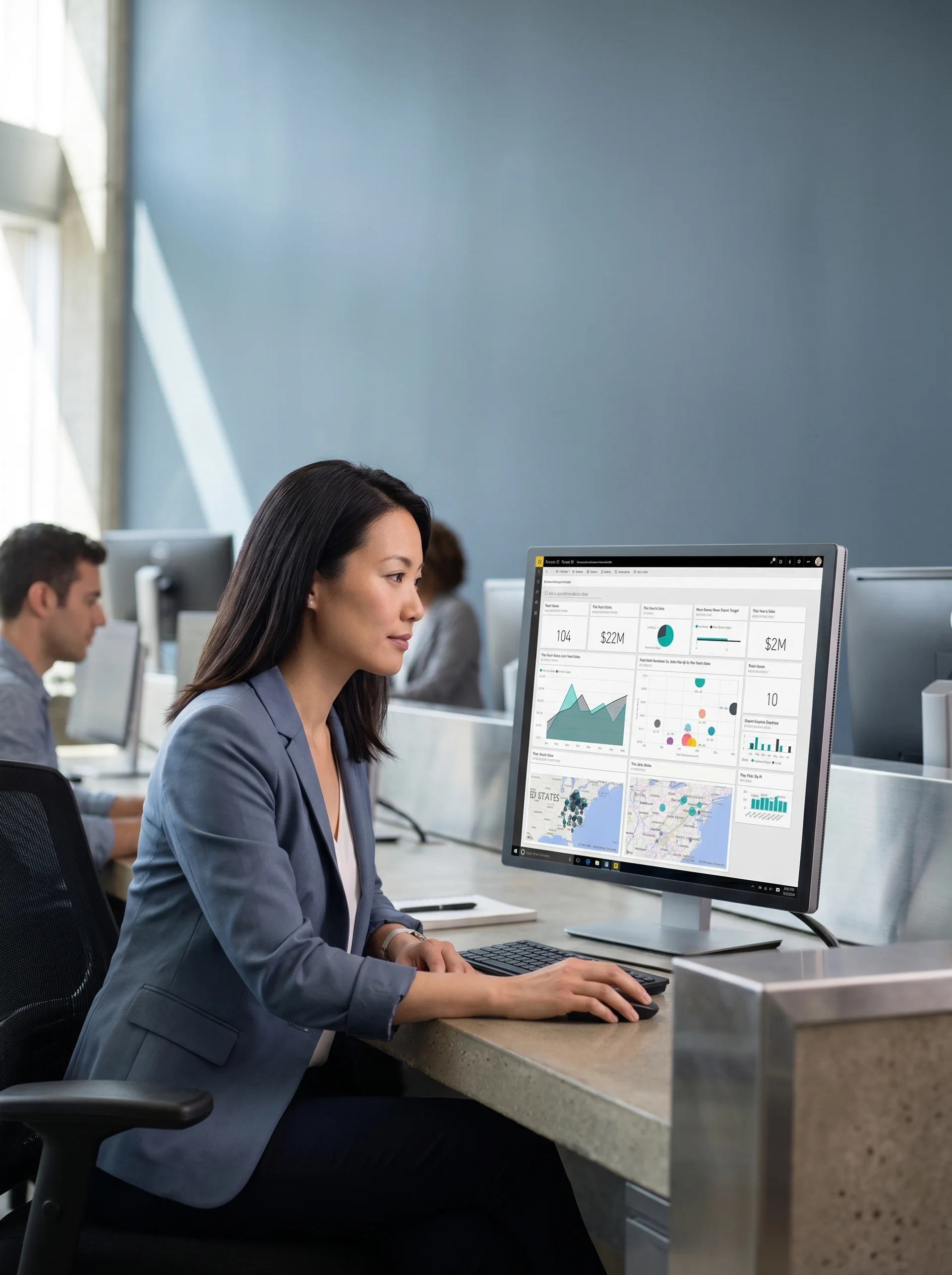 Operations manager reviewing integrated system dashboards in modern enterprise setting Operations manager reviewing integrated system dashboards in modern enterprise setting