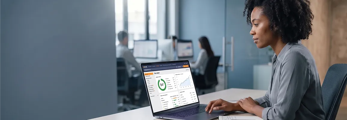 SEO analyst reviewing Shopify store organic search rankings and keyword gap data on laptop SEO analyst reviewing Shopify store organic search rankings and keyword gap data on laptop