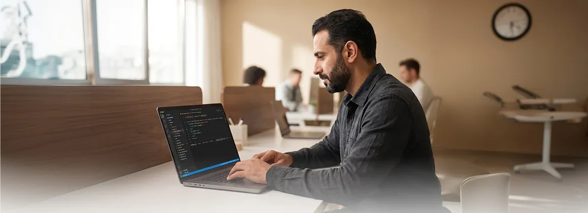 Founder reviewing fixed Shopify technical SEO performance data and organic ranking improvements at desk