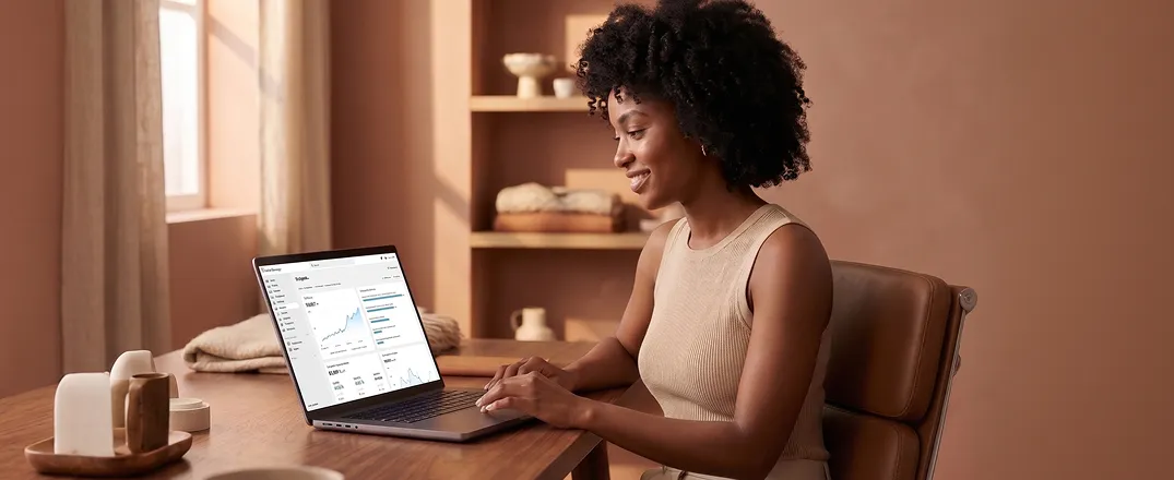 Fashion brand ecommerce team reviewing luxury storefront redesign results and revenue metrics on laptop Fashion brand ecommerce team reviewing luxury storefront redesign results and revenue metrics on laptop