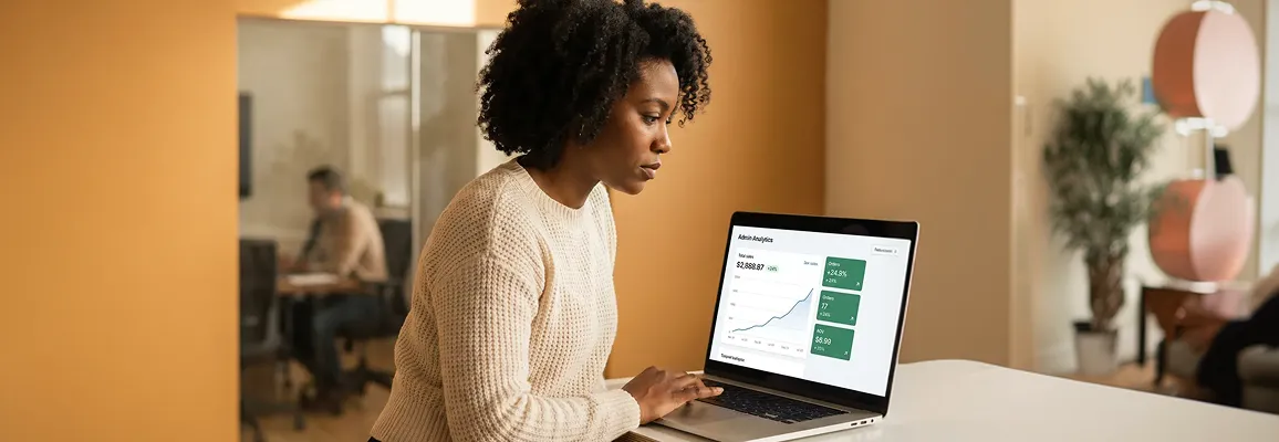 Ecommerce growth analyst reviewing conversion rate data and charts on a laptop screen with multiple graphs Ecommerce growth analyst reviewing conversion rate data and charts on a laptop screen with multiple graphs