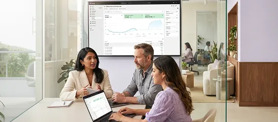 Ecommerce growth team discussing conversion optimization strategy in a bright modern collaborative office Ecommerce growth team discussing conversion optimization strategy in a bright modern collaborative office
