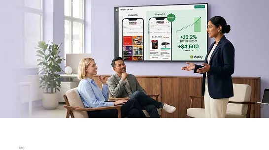 Growth analyst presenting A/B test results and revenue lift data to ecommerce stakeholders in a bright modern office Growth analyst presenting A/B test results and revenue lift data to ecommerce stakeholders in a bright modern office
